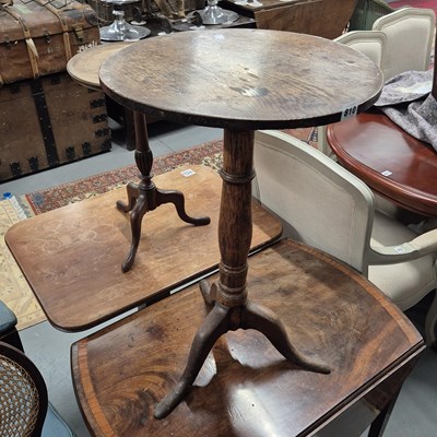 Lot 810 - A Georgian country oak tripod table.