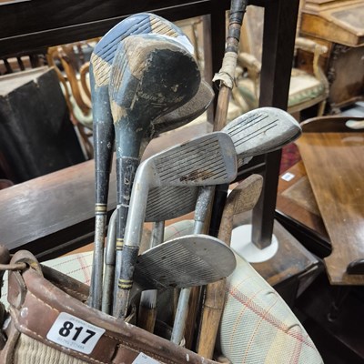 Lot 817 - a bag of vintage golf clubs