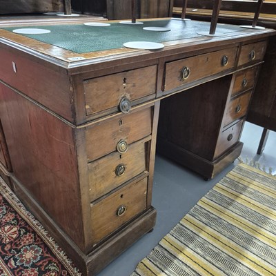 Lot 827 - A late Victorian twin pedestal desk.