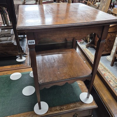 Lot 828 - A Mahogany two-tier occasional table.