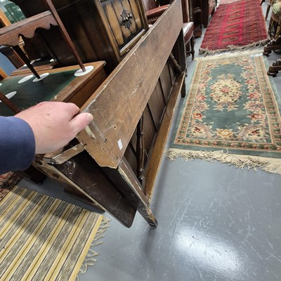 Lot 830 - An oak wall-mounted drop leaf side table /server.