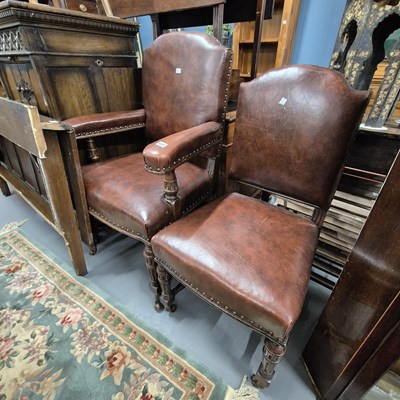 Lot 831 - A brass-studded upholstered armchair and...
