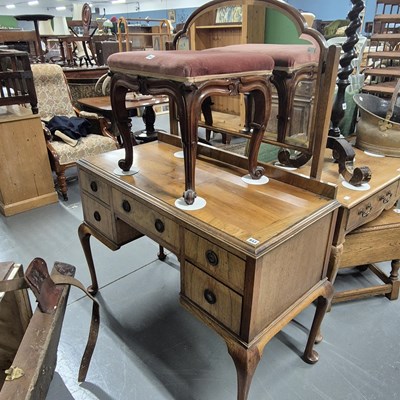 Lot 843 - A vintage walnut dressing table with a mirror...