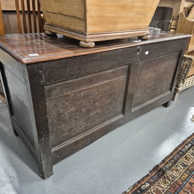 Lot 865 - An 18th century oak two panel coffer with...