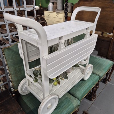 Lot 881 - A plastic patio drinks trolly