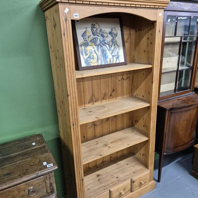 Lot 885 - A pine open front tall bookcase. H180 x W91 x...