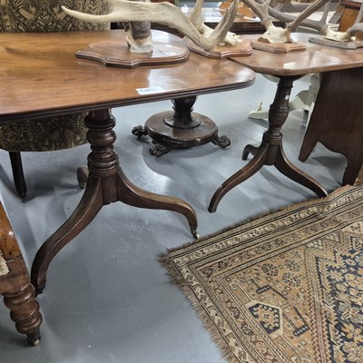 Lot 890 - Two 19th-century mahogany tripod tables.