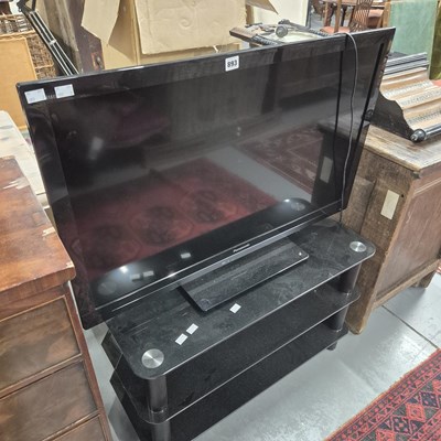 Lot 893 - A Panasonic flat screen TV, with three-tier...