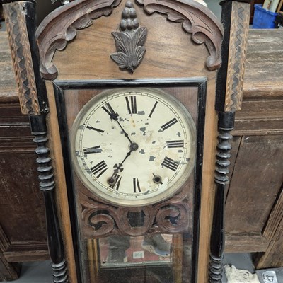Lot 894 - A Victorian wall clock.
