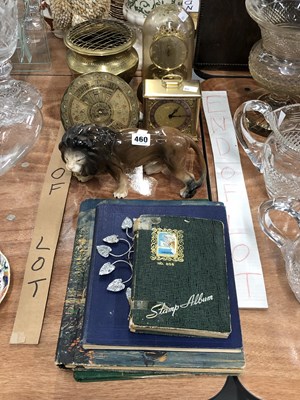Lot 460 - Four stamp albums, two clocks, a brass...
