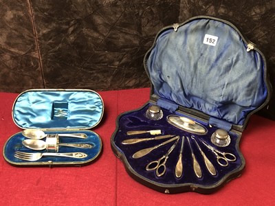 Lot 152 - A cased and fitted part silver hallmarked...