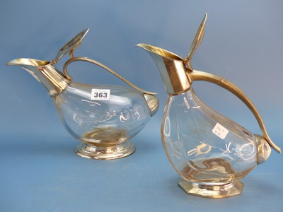 Lot 363 - Two similar French pewter mounted clear glass...