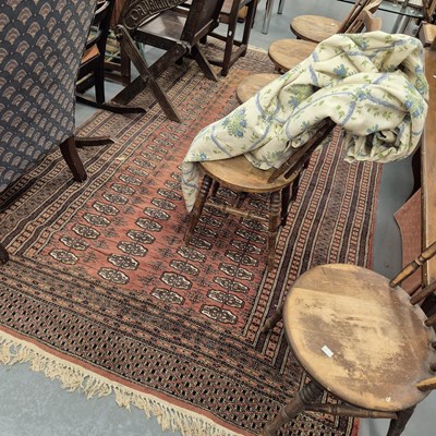 Lot 968 - An oriental rug of Bokhara design 280 x 175