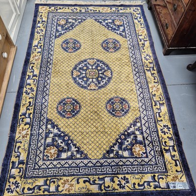 Lot 978 - An antique Chinese rug 241 x 148cms