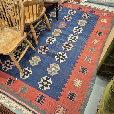 Lot 979 - A decorative tribal kelim 239 x 175cms