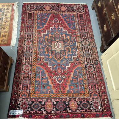 Lot 989 - A Persian tribal rug 186 x 118cms