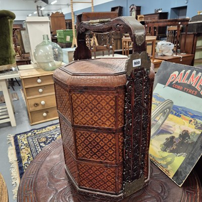 Lot 900 - A vintage oriental sectional food carrier.