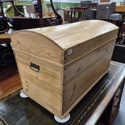 Lot 911 - An antique pine dome top trunk /blanket box.