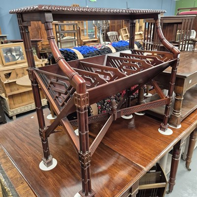 Lot 913 - A Chippendale-style mahogany book stand.