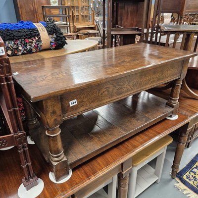Lot 914 - A bespoke oak coffee table. H 46 W 142 D 46 cm