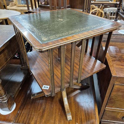 Lot 916 - A small revolving bookcase