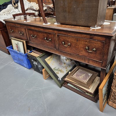 Lot 939 - An 18th-century oak three-drawer dresser with...