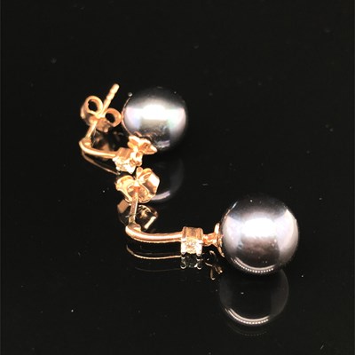 Lot 174 - A pair of iridescent dark pearl and diamond...