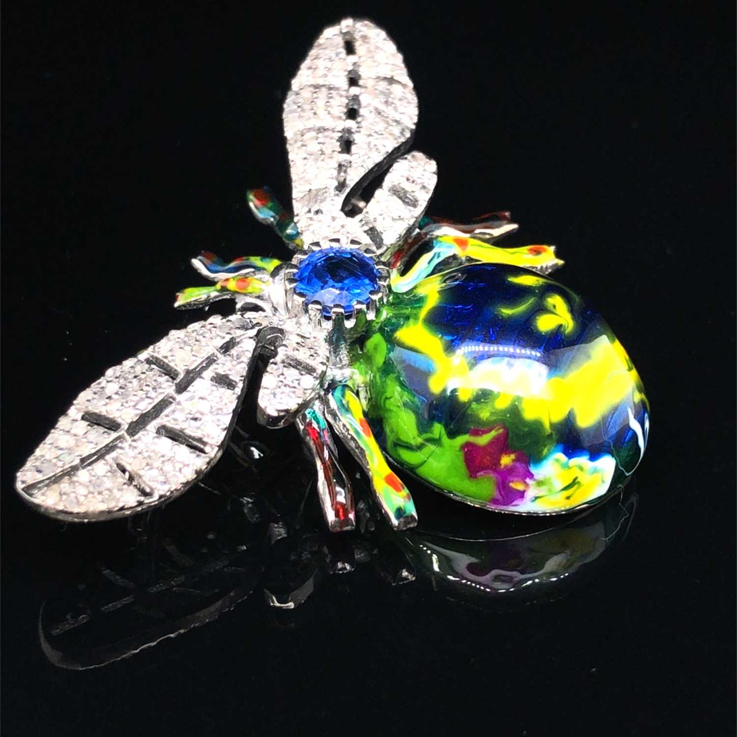 Lot 188 - An unusual silver winged insect brooch and