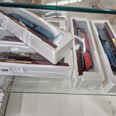 Lot 592 - A group of various diecast trains and model...