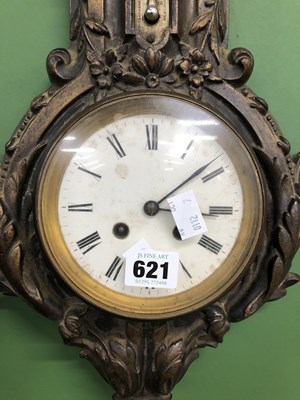 Lot 621 - A clock barometer in cast metal case