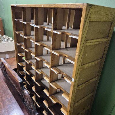 Lot 675 - An impressive large pigeon hole cabinet