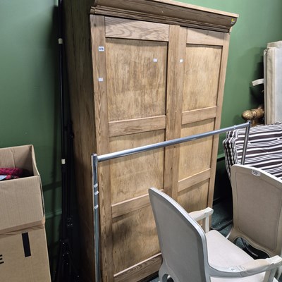 Lot 676 - An antique pine panel door shelved scullery...