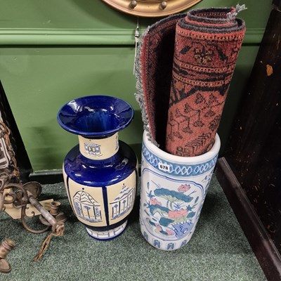 Lot 678 - A vintage rug, a pottery stick stand and an...