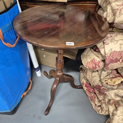 Lot 681 - A 19th century mahogany tripod table