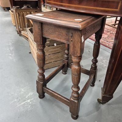 Lot 692 - An antique oak stool