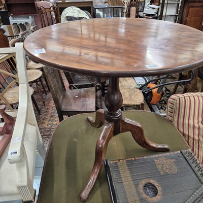 Lot 698 - A 19th century Mahogany tripod table.