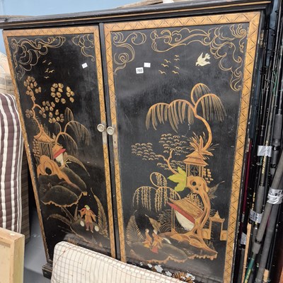 Lot 703 - A lacquer decorated wardrobe cabinet. H 158 W...