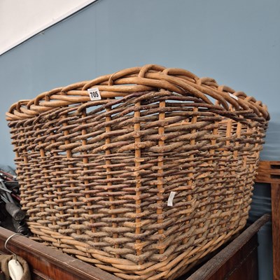Lot 705 - A log basket