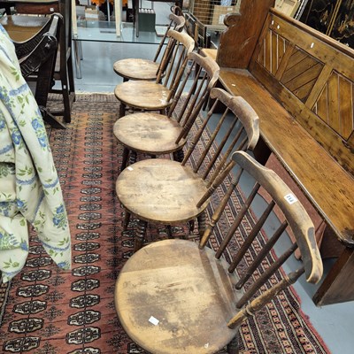 Lot 713 - Five antique Welsh comb back penny seat chairs