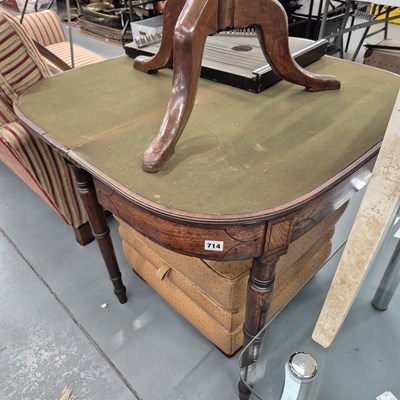 Lot 714 - A Georgian fold over card table