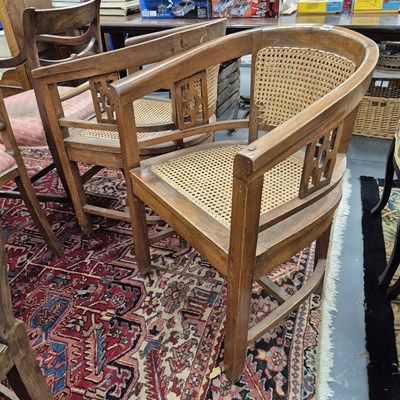 Lot 728 - A pair of antique colonial teak bergere armchairs