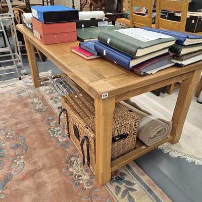 Lot 734 - An oak dining table. H 76 W 180 D 90 cm