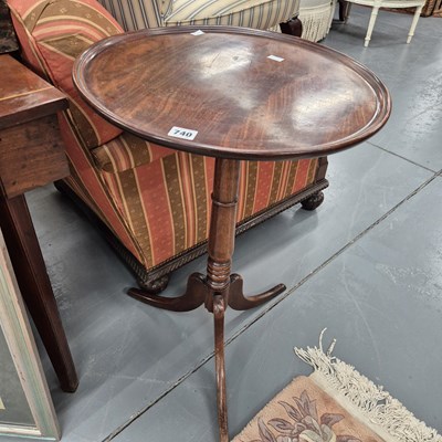 Lot 740 - A 19th century mahogany tripod table.