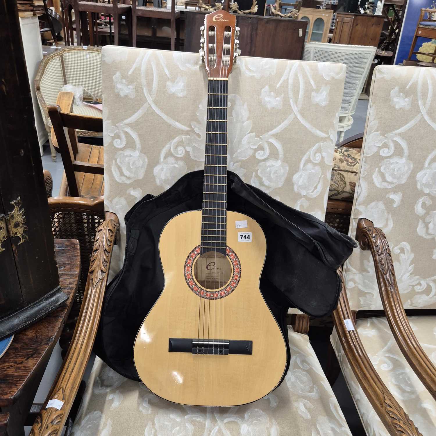 Lot 744 - An accustic guitar