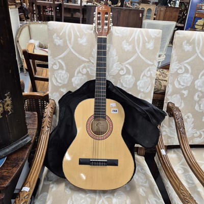 Lot 744 - An accustic guitar