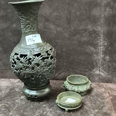 Lot 194 - A Chinese bronze vase, with two small bronze...