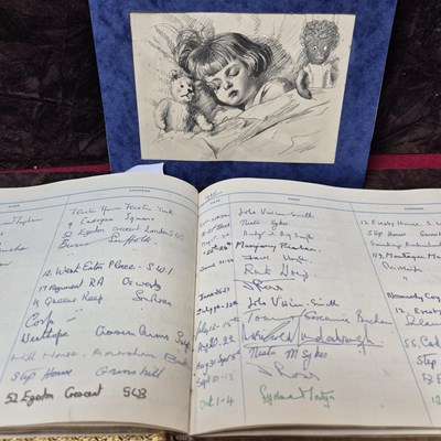 Lot 195 - A vintage visitor book beginning with 32 Ebury...