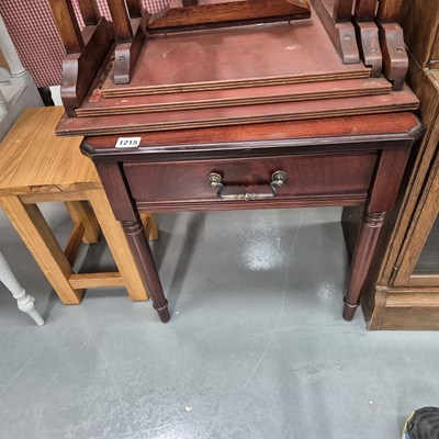 Lot 1215 - A nest of table and two occasional tables