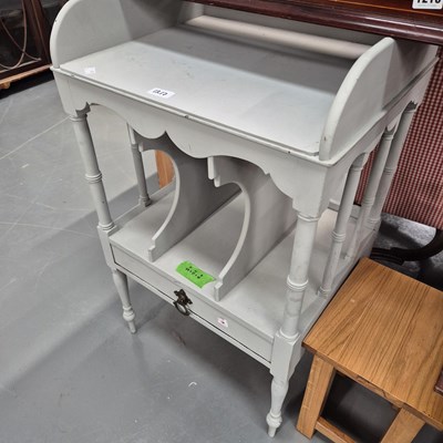 Lot 1217 - A painted music stand / side table