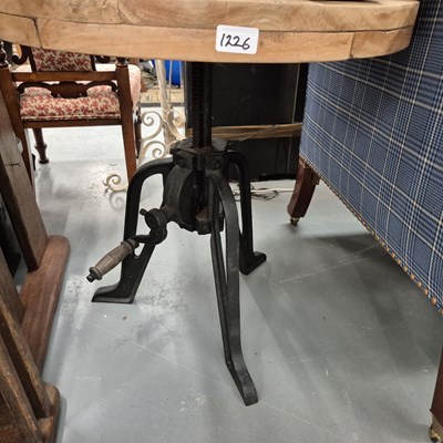Lot 1226 - A pine-topped occasional table with industrial...